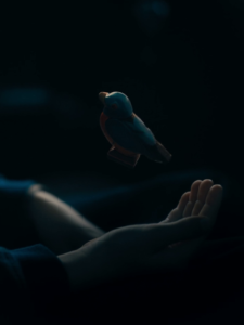 Harlan levitates a bird-shaped wooden toy in his last scene of season two of The Umbrella Academy