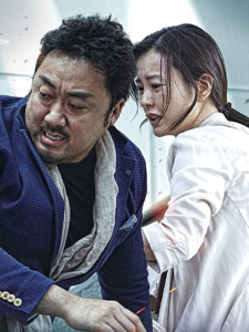 Ma Dong-Seok e Jung Yu-mi nei ruoli di Sang-Hwa e Sung-Gyeong in Train to Busan.