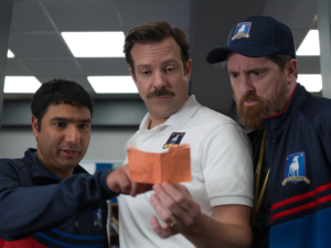 AFC Richmond's three "coaches" in Ted Lasso (from left to right Nick Mohammed as Nathan, Jason Sudeikis as Ted, and Brandon Hunt as Coach Beard)