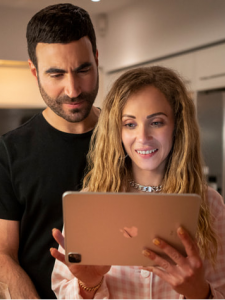 Brett Goldstein and Juno Temple as Roy Kent and Keeley Jones in season two of Ted Lasso