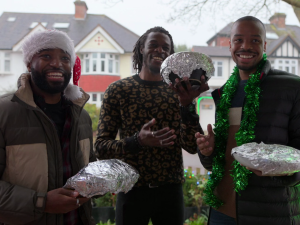 Some AFC Richmond players arrive at the Higgins house for the Christmas celebrations in Ted Lasso Carol of the Bells