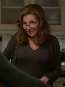 Kathy Najimy as Carole in Single All The Way