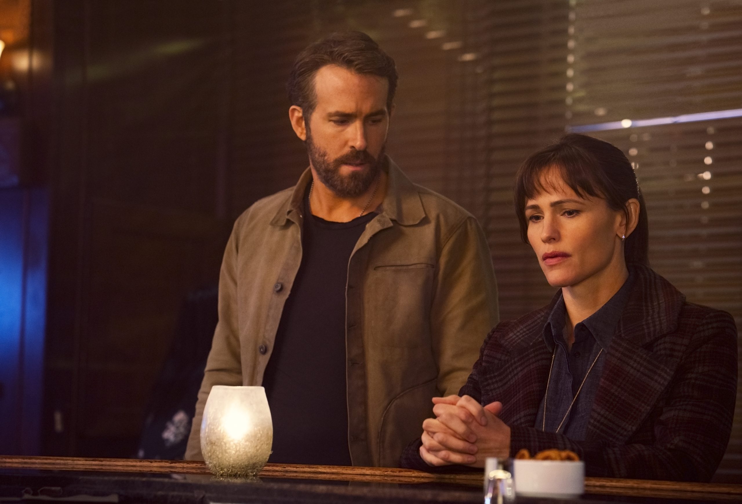 The Adam Project (L to R) Ryan Reynolds as Big Adam and Jennifer Garner as Ellie. Cr. Doane Gregory/Netflix © 2022