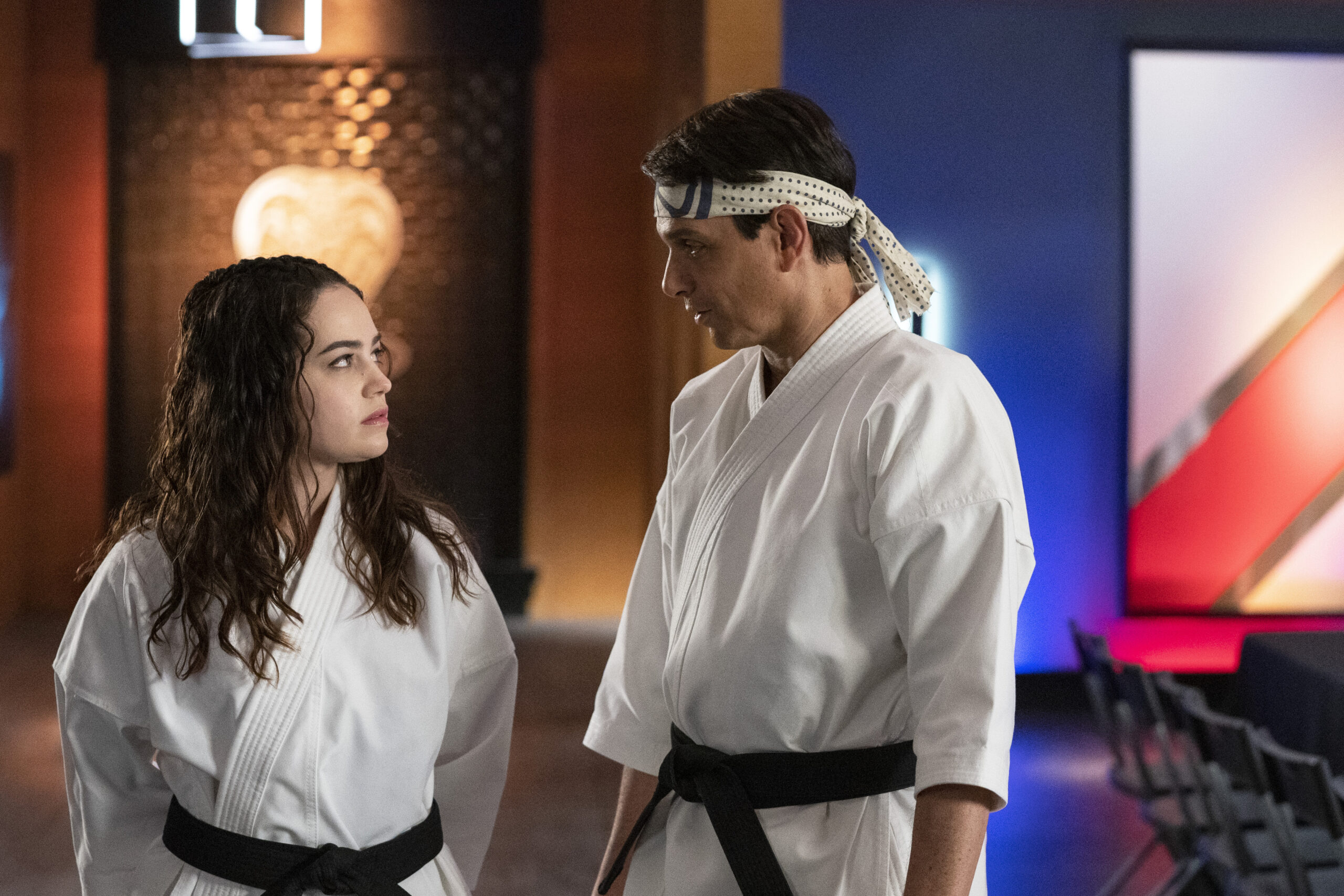 Cobra Kai. (L to R) Mary Mouser as Samantha LaRusso, Ralph Macchio as Daniel LaRusso in episode 508 of Cobra Kai. Cr. Curtis Bonds Baker/Netflix © 2022