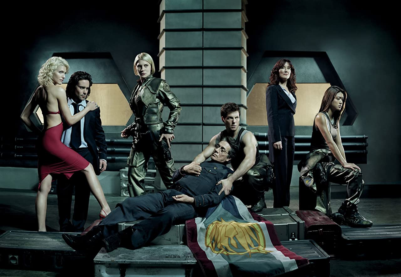 Mary McDonnell, Edward James Olmos, Jamie Bamber, James Callis, Aaron Douglas, Grace Park, Katee Sackhoff, and Tricia Helfer in Battlestar Galactica (2004)