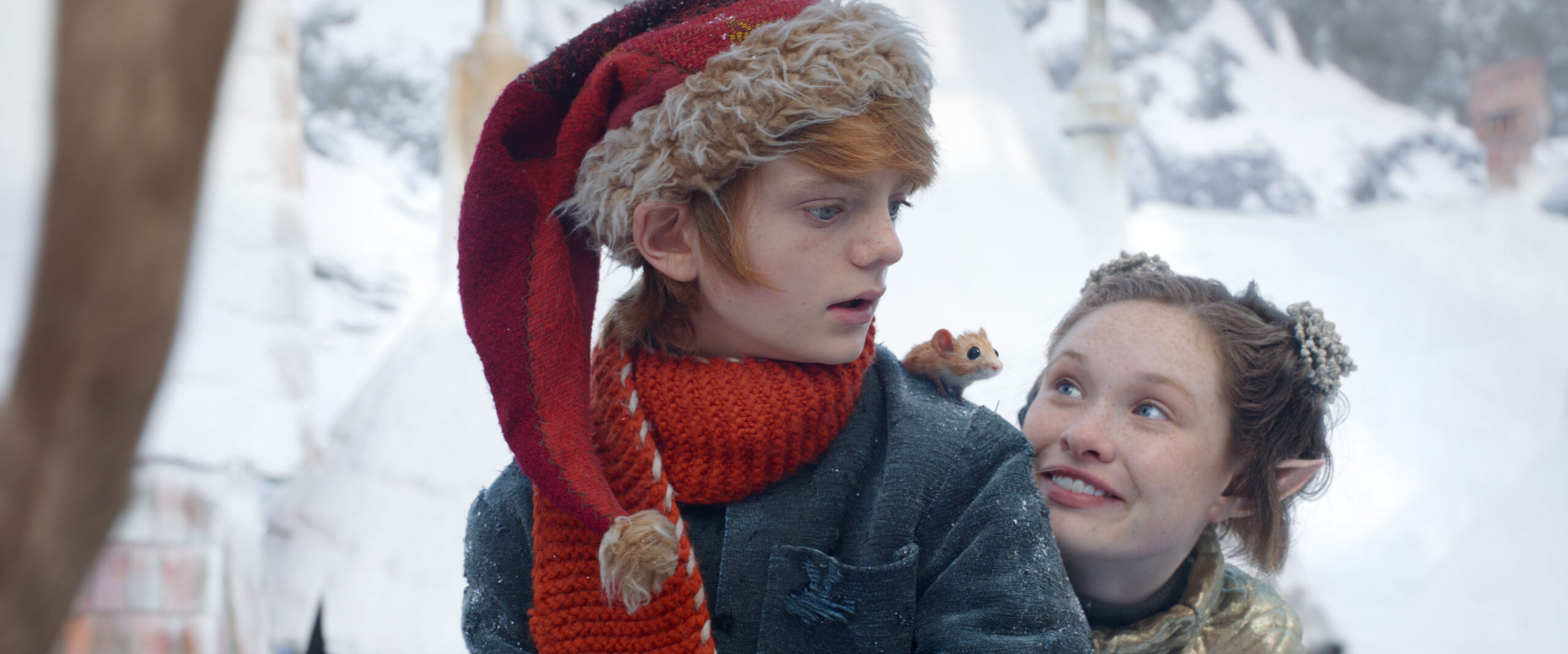 A BOY CALLED CHRISTMAS - (L-R) Henry Lawfull as Nikolas, Miika the Mouse (voiced by Stephen Merchant) and Zoe Margaret Colletti as The Truth Pixie . Cr: NETFLIX © 2021 Netflix US, LLC - Studiocanal SAS