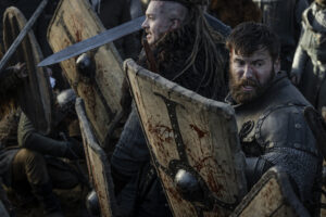 The Last Kingdom: Seven Kings Must Die. (L to R) Alexander Dreymon as Uhtred and Mark Rowley as Finan in The Last Kingdom: Seven Kings Must Die. Cr. Courtesy of Netflix © 2023