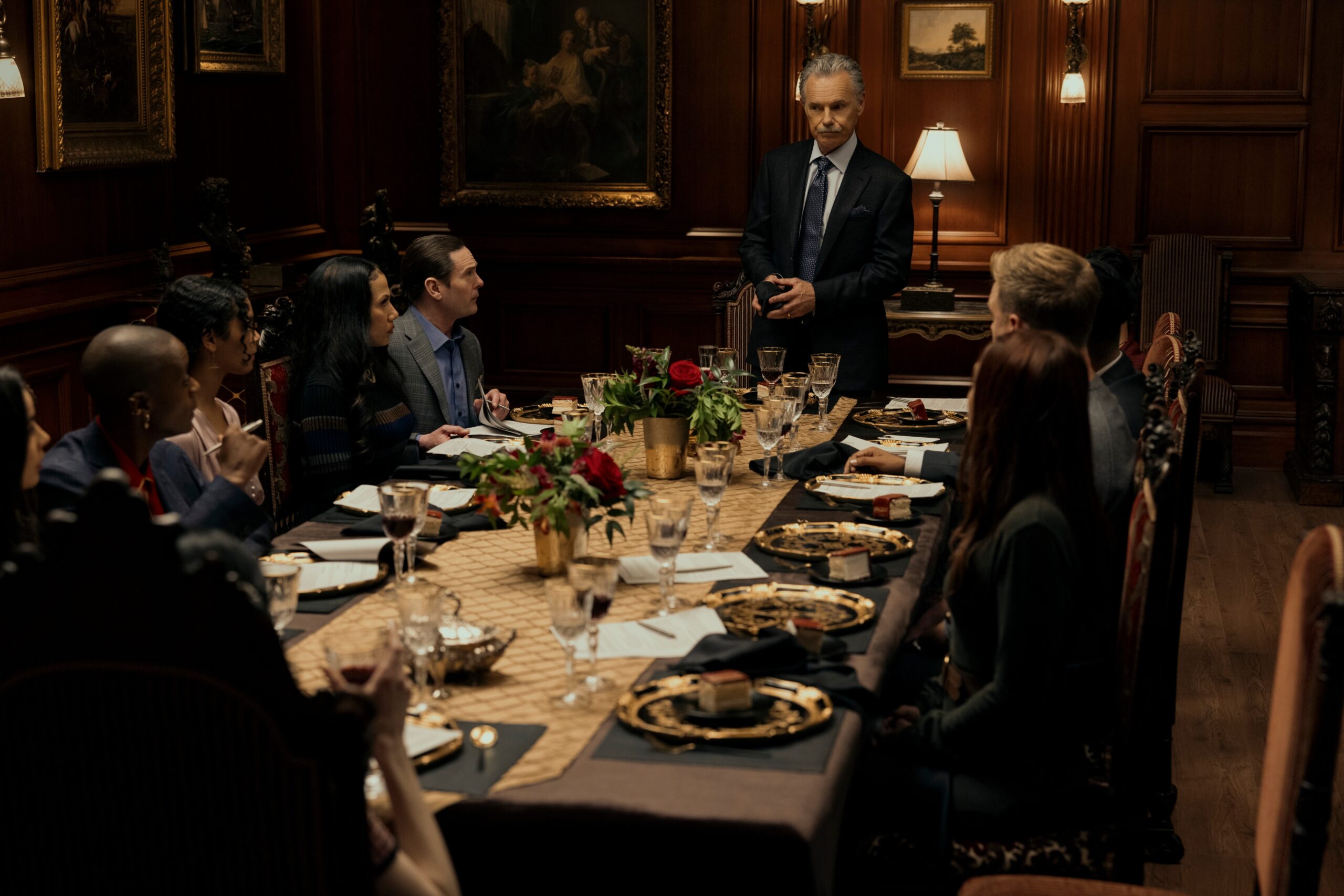 The Fall of the House of Usher. (L to R) Paola Nuñez as Dr. Alessandra Ruiz, T'Nia Miller as Victorine LaFourcade, Kyliegh Curran as Lenore Usher, Crystal Balint as Morella Usher, Henry Thomas as Frederick Usher, Bruce Greenwood as Roderick Usher, Samantha Sloyan as Tamerlane Usher, Matt Biedel as Bill-T Wilson in episode 101 of The Fall of the House of Usher. Cr. Eike Schroter/Netflix © 2023